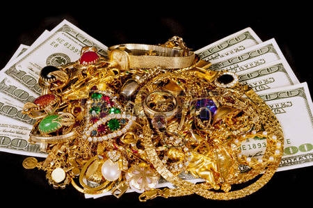 40356347-gold-jewelry-with-money-on-black-background